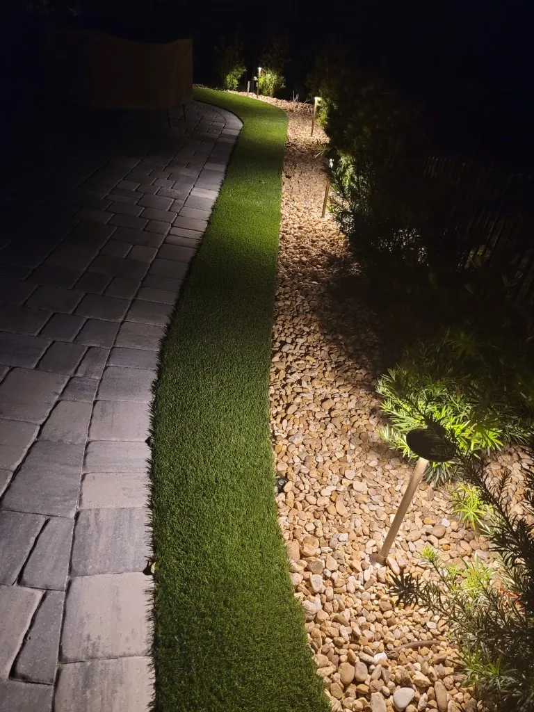 Artificial Turf and Stone Bed Lighting with 24 Brass Path Lighting