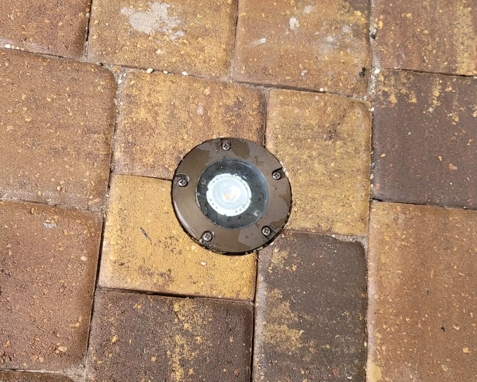 Perfect core drilled recessed paver lights in your driveway or walkway.