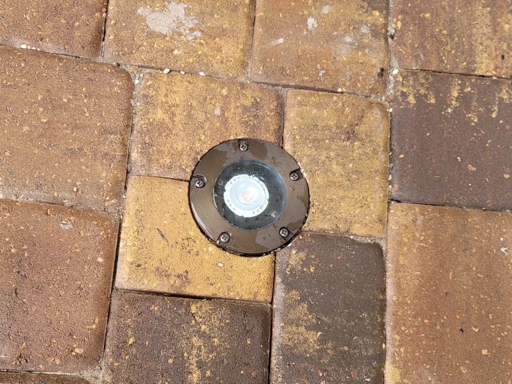 Perfect core drilled recessed paver lights in your driveway or walkway.